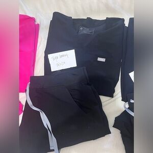 Two sets of black figs, scrubs